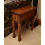 A pair of recent stained beech Gothic style rectangular occasional tables, each with a frieze drawer