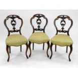 A set of 6 Victorian walnut standard chairs