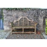 A Chatsworth type teak slatted garden bench.168cm wide, 59cm deep, 102cm highFootnote: Provenance: