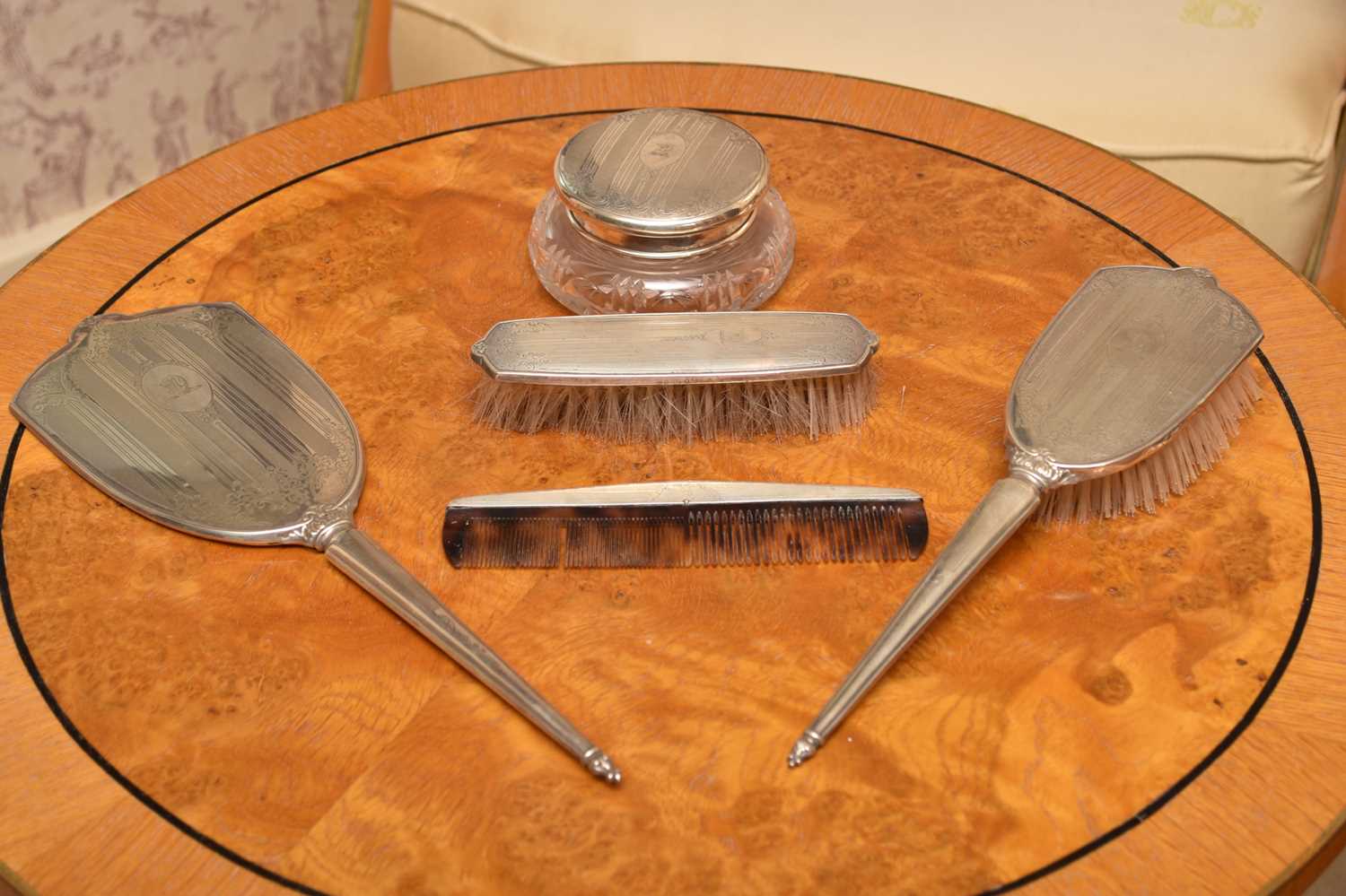 A silver mounted five piece dressing table set