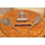 A silver mounted five piece dressing table set