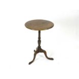 An early-mid 19th century mahogany, tilt-top tripod table