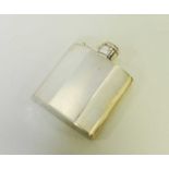 An engine turned silver hip flask