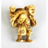 A Japanese netsuke of a farmer with his son in a papoose on his back, signed Tamayama, 4.5cm
