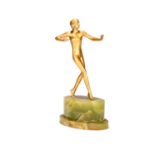 An Art Deco figure of a walking nude