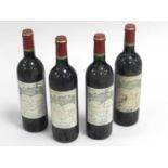 Four bottles of Chateau Calon-Segur, St Estephe, 1997