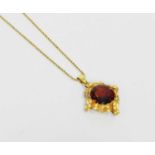 A citrine pendant on chain