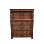 A 20th century, 17th century style, stained oak court cupboard