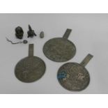 An assembled group of Chinese and South East Asian metalwares, including three reproduction bronze