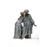 A patinated spelter figure group allegorical of Autumn