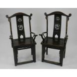 A pair of Chinese softwood armchairs, 20th century, possibly cedar wood, of yoke back form with
