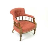 A late Victorian walnut armchair