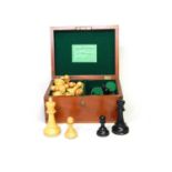 An early 20th century Jaques, Staunton pattern, boxwood and ebonised weighted, boxed chess set