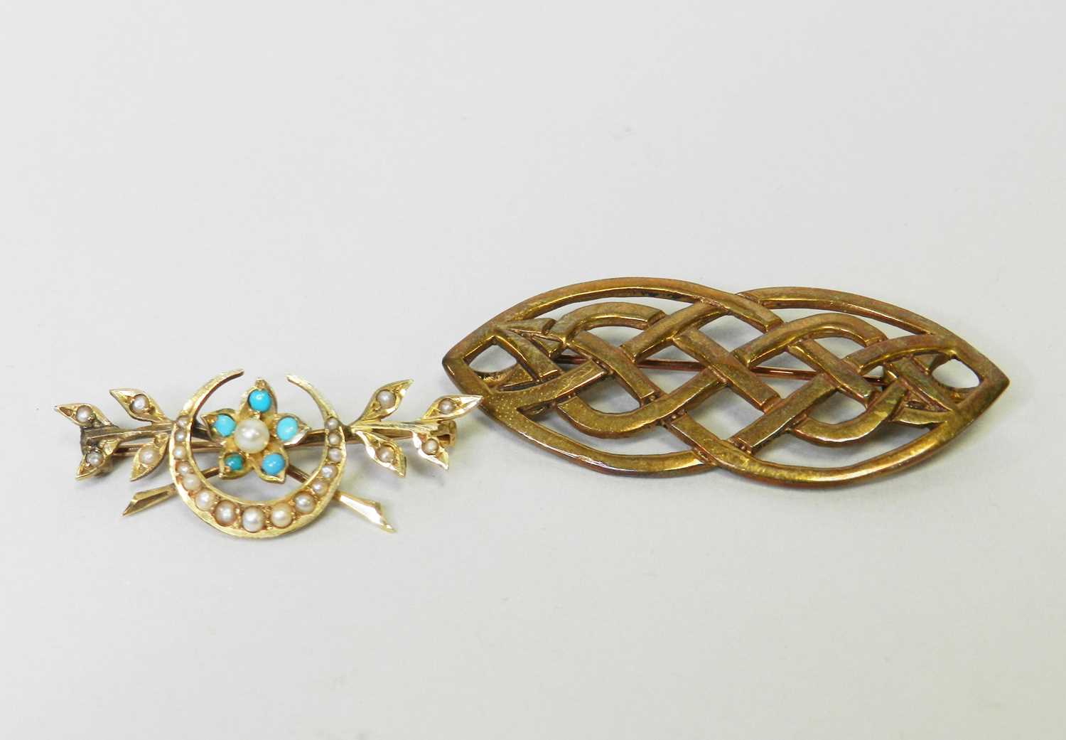 Two brooches