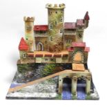 An early-mid 20th century wooden model of a castle