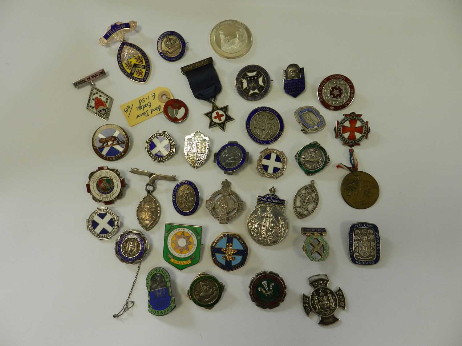 A collection of sixty-three silver and enamelled nursing medals - Image 2 of 3