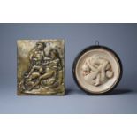 A cast brass erotic plaque and a cast plaster erotic plaque