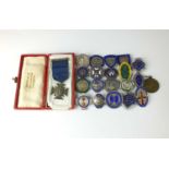 A collection of sixty-three silver and enamelled nursing medals