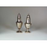 Two George III silver sugar casters