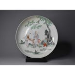 A large Chinese famille rose dish, Yongzheng six-character mark but probably 19th centuryOf plain