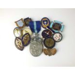 A collection of nursing badges