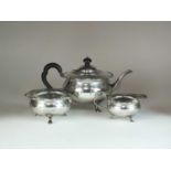 A three piece silver tea service