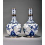 A pair of Chinese cloisonne vases, Qing Dynasty