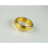 A 22ct gold wedding band