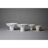 Four Chinese blanc-de-chine porcelain libation cups, Qing Dynasty