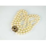 A two strand uniform cultured pearl necklace