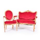 A pair of 19th century, Louis XVI style, gilded armchairs