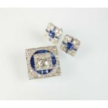 An Art Deco diamond and sapphire brooch with associated earrings