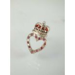 A 9ct white gold diamond, ruby and enamel heart and crown brooch