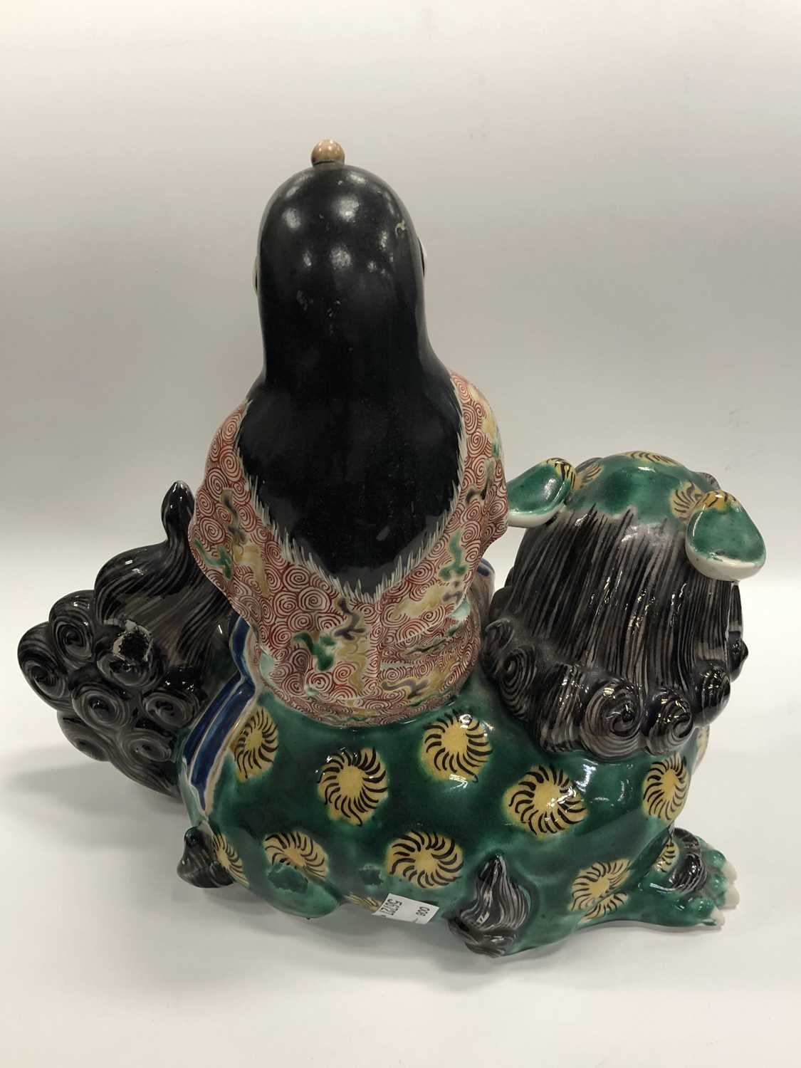 A Japanese Kutani figure of Kannon seated on a lion - Image 2 of 6