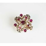 A late 19th century diamond and ruby brooch/pendant