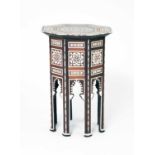 A Syrian, octagonal occasional table, circa 1900, unusually tall