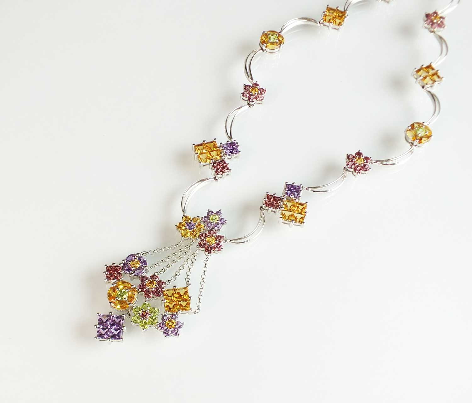 A multi-gem set floral necklace