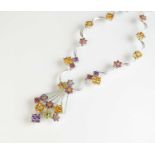 A multi-gem set floral necklace