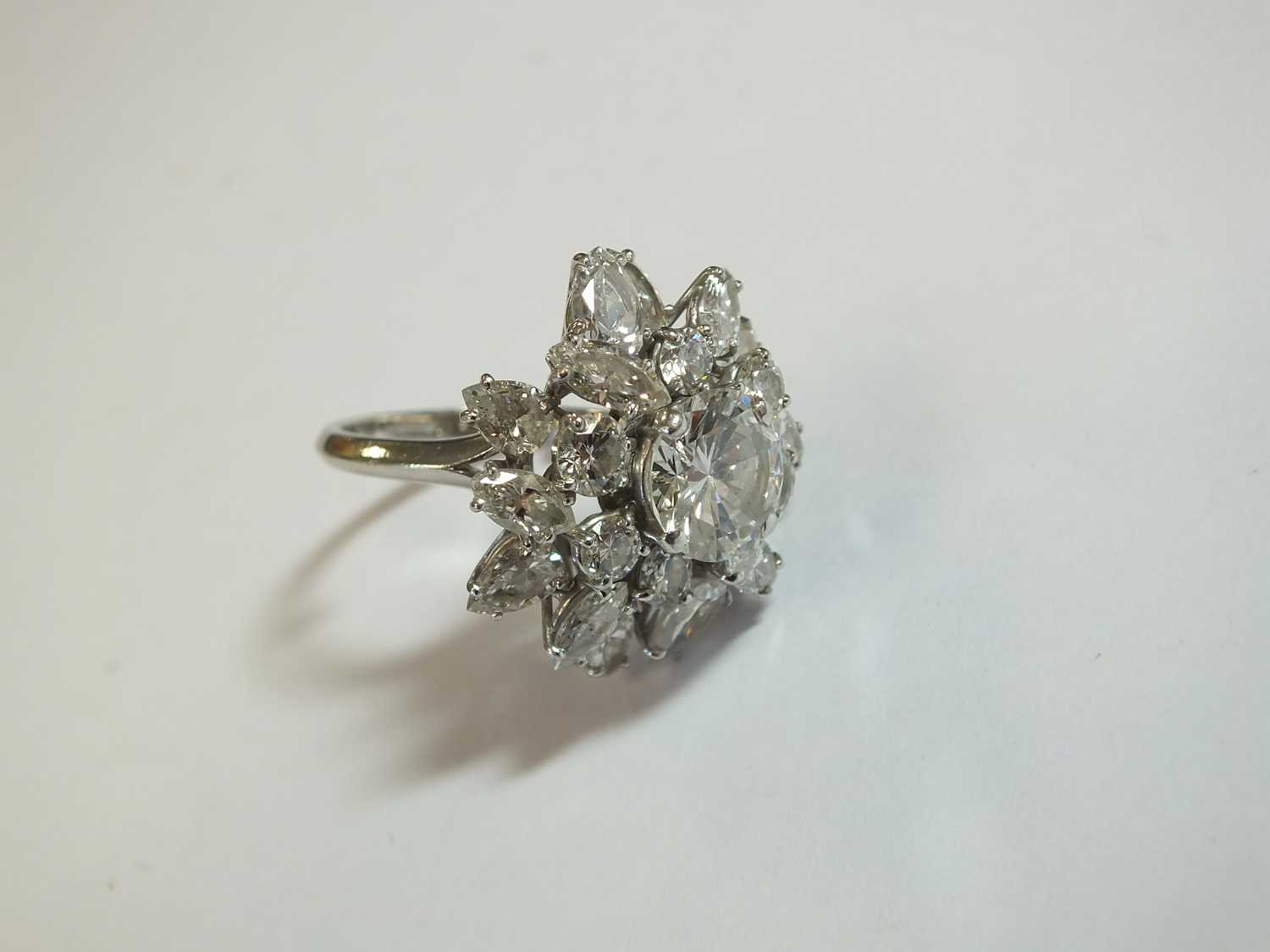 An impressive diamond cluster ring by Boucheron, designed as a central brilliant cut diamond claw - Image 7 of 13