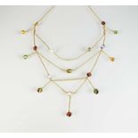 A multi-gem set fringe necklace