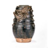 A Chinese brown glazed relief moulded vase, Song Dynasty