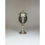 An Edwardian silver mounted coconut cup and cover