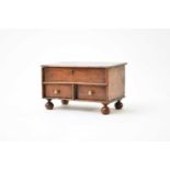 An 18th century miniature oak mule chest