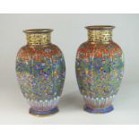 An unusual near pair of Coalport vases