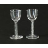 Two opaque twist wine glasses