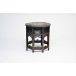 An Indian, rosewood-type, octagonal occasional table, circa 1900, inlaid with brass and copper