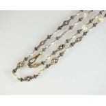 A yellow and white metal freshwater pearl set necklace
