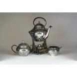 A Jugendstil three piece silver plated tea service by Moritz Hacker,
