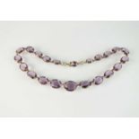 A 19th century purple paste riviere necklace