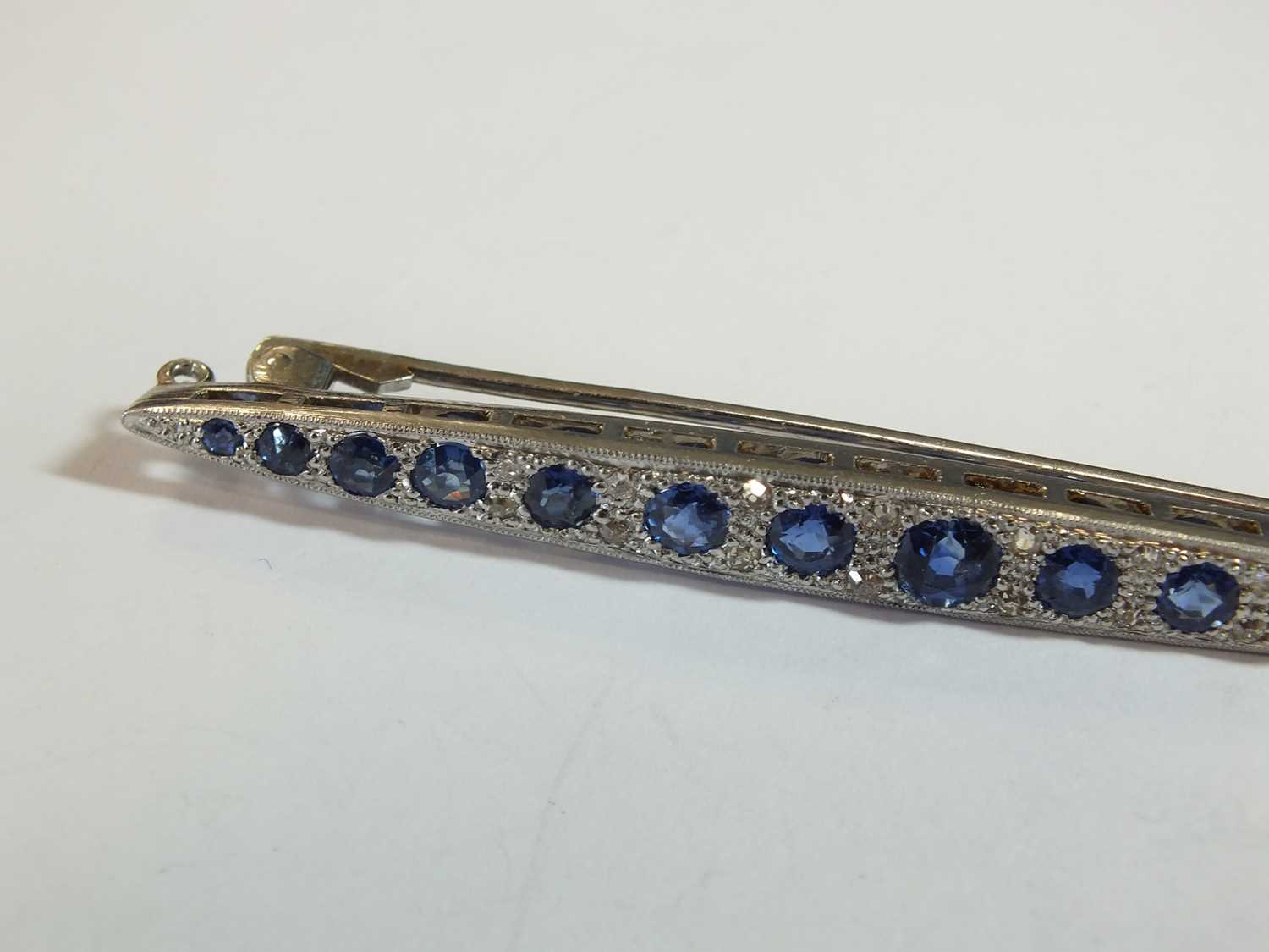 A Victorian style graduated sapphire and diamond line brooch - Image 5 of 8